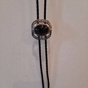 Bolo Tie Black Leather Braided Rope And Silvertone